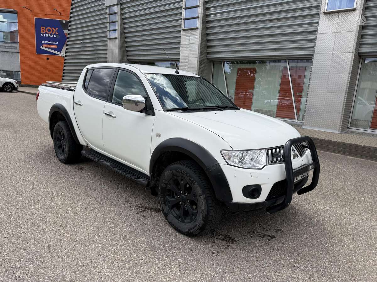 Mitsubishi L200 2012 — photo 7