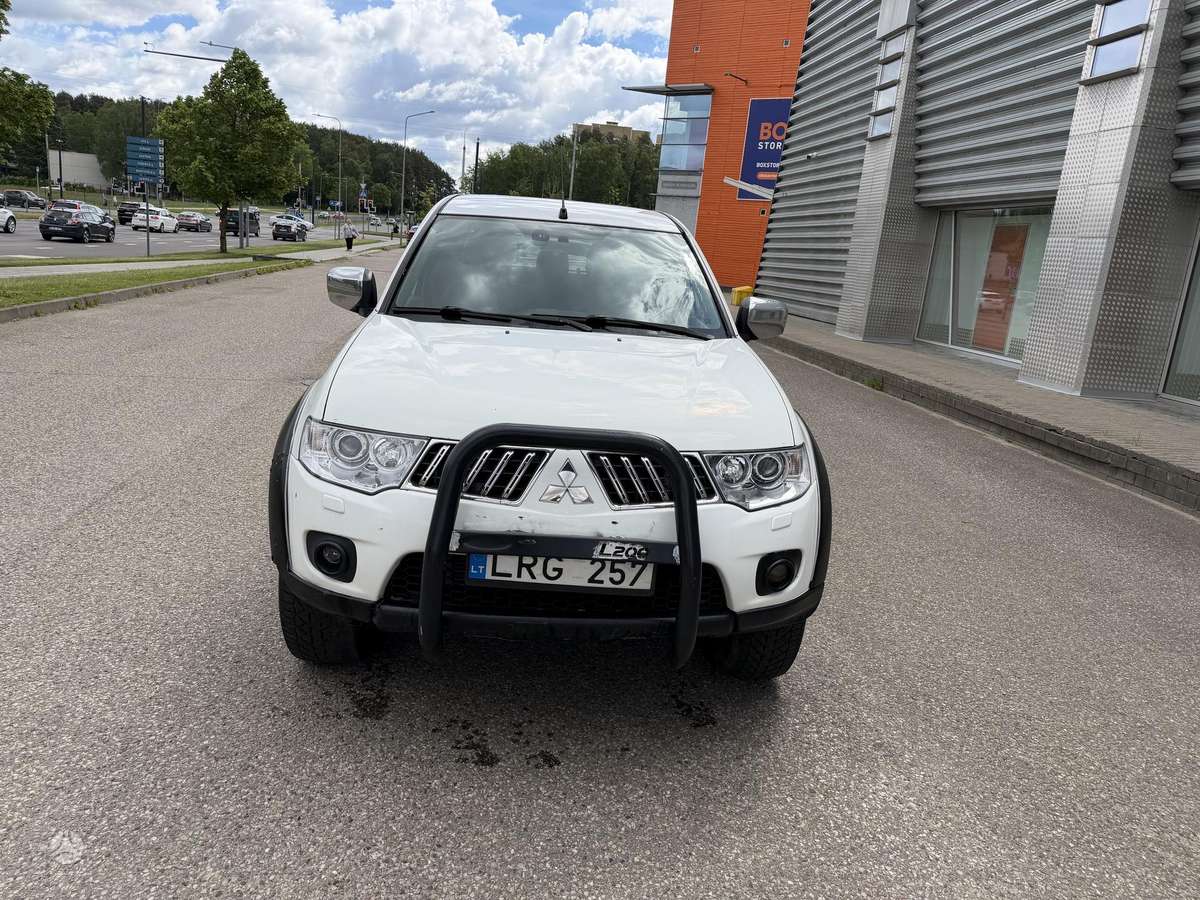 Mitsubishi L200 2012 — photo 8