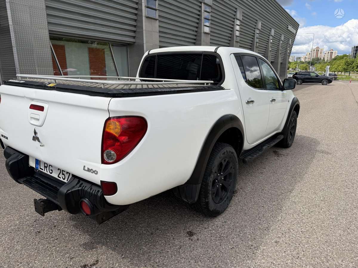 Mitsubishi L200 2012 — photo 9