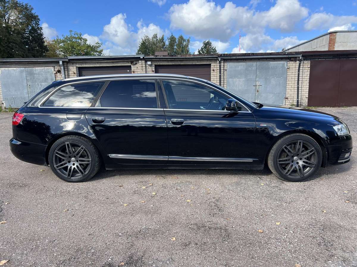 Audi A6 2011 — салон