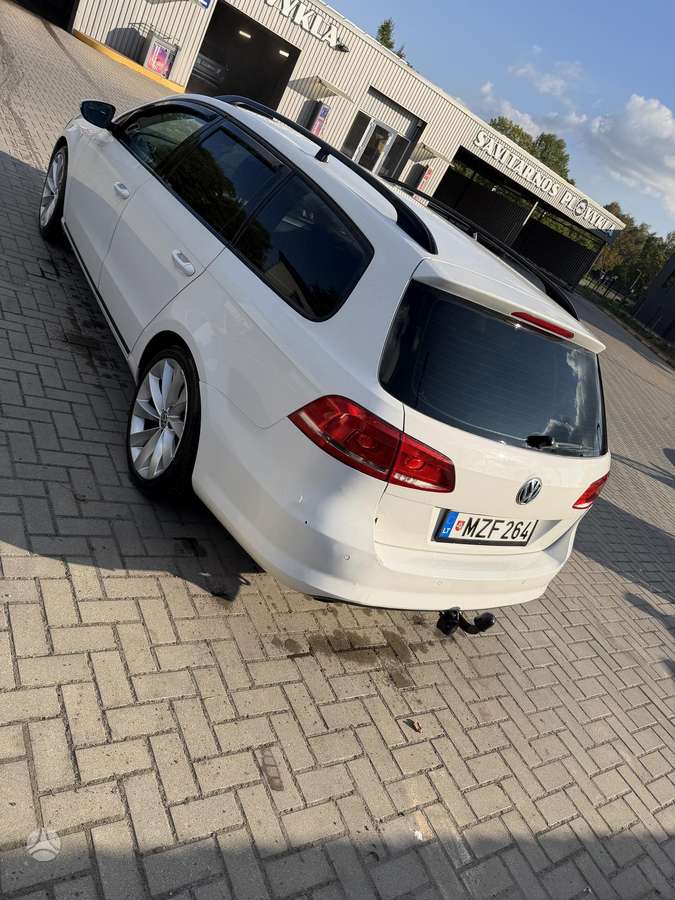Volkswagen Passat 2014 — вигляд ззаду