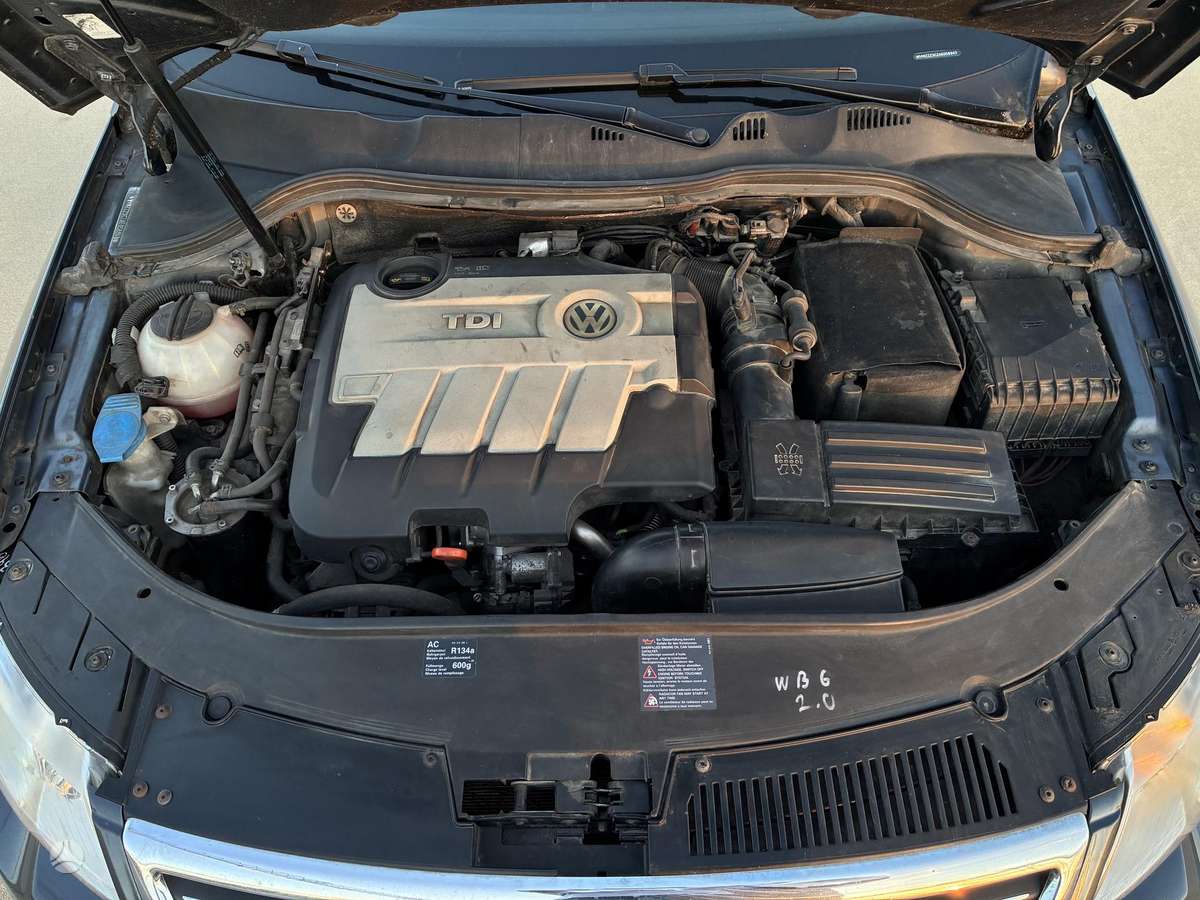 Volkswagen Passat 2009 — photo 12