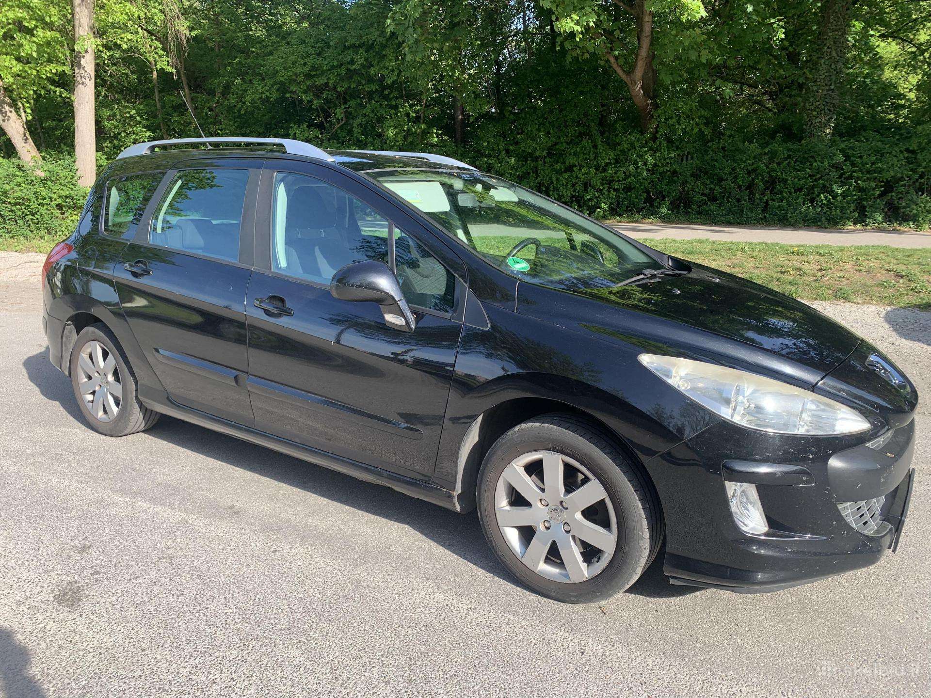 Peugeot 308 2010 — вигляд ззаду
