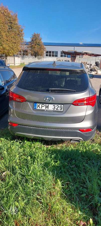 Hyundai Santa 2015 — вигляд ззаду