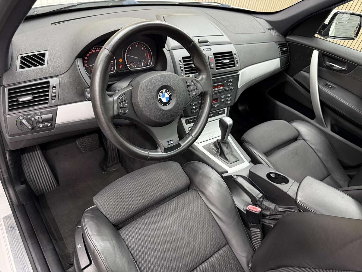 BMW X3 2008 — rear view