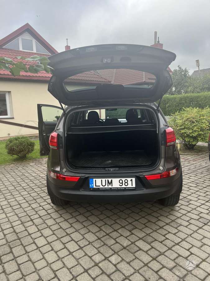 Kia Sportage 2015 — engine 1685 cm³, 116 HP (85kW)