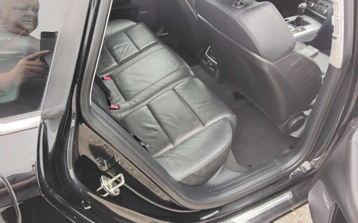 Audi A6 2009 — photo 11