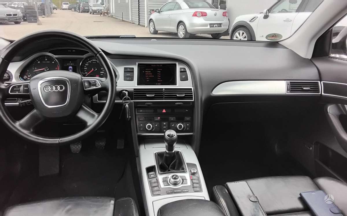 Audi A6 2009 — photo 12