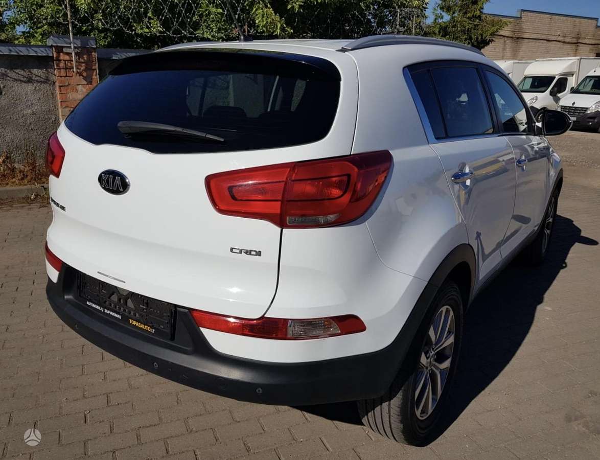 Kia Sportage 2015 — engine 1685 cm³, 116 HP (85kW)