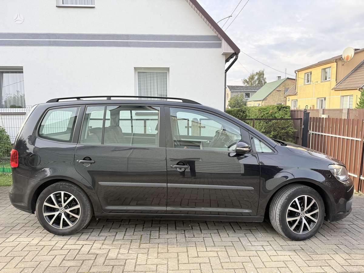 Volkswagen Touran 2014 — engine 1600 cm³, 105 HP (77kW)