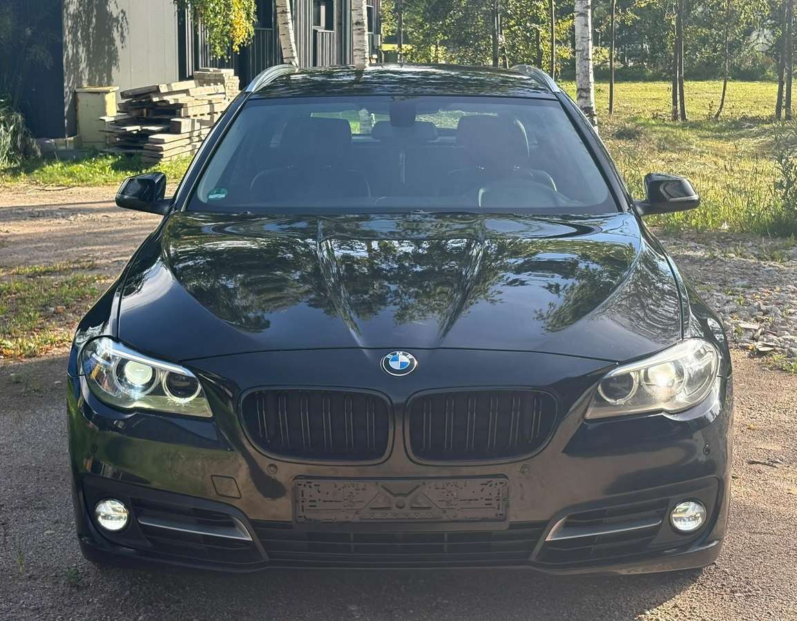 BMW 520 2013 — rear view