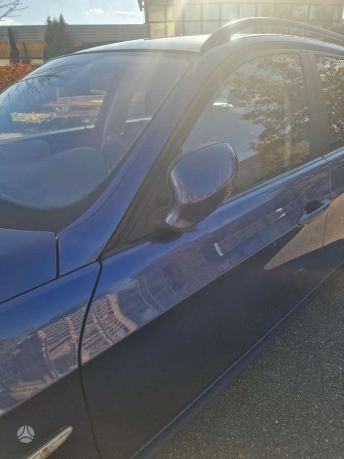 BMW 320 2009 — photo 19