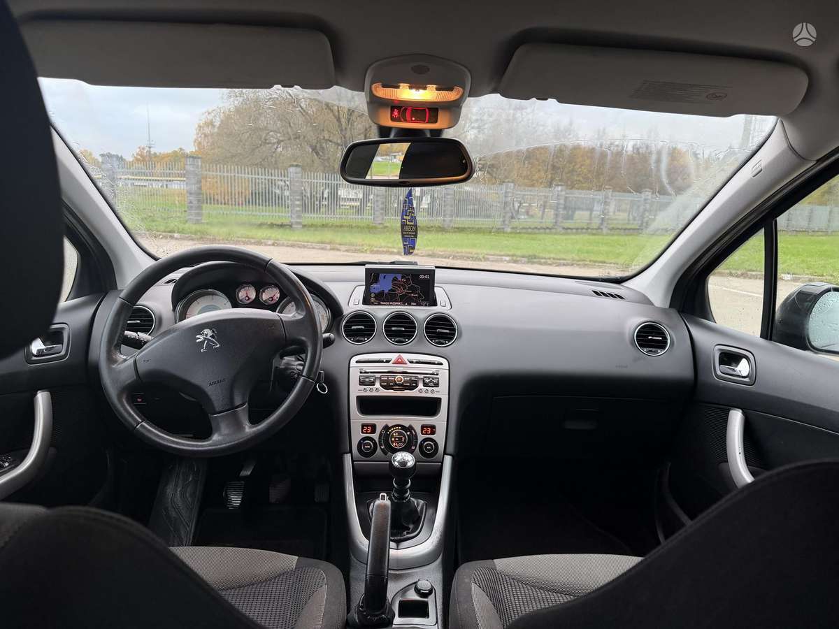 Peugeot 308 2012 — photo 9