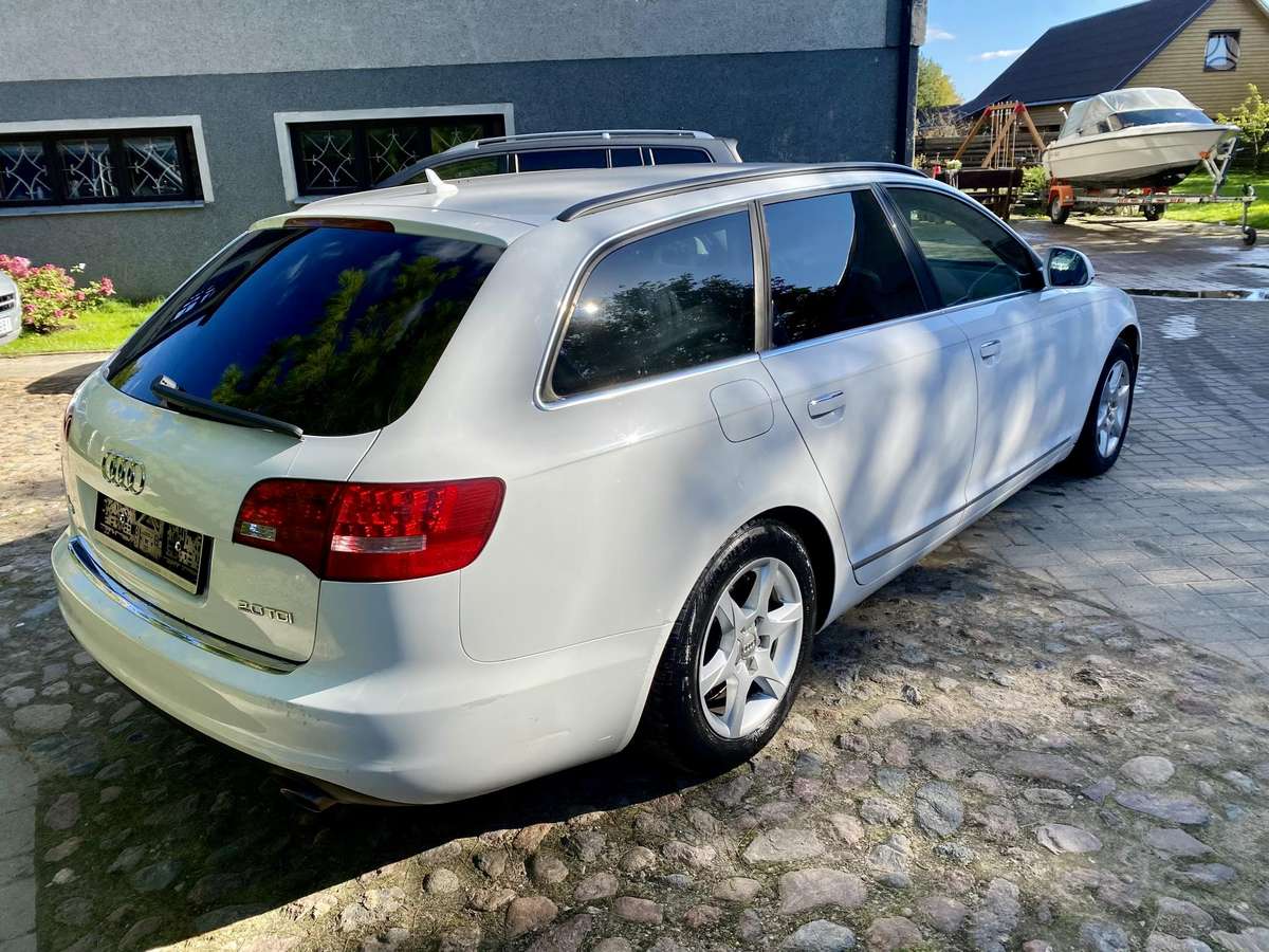 Audi A6 2009 — engine 1968 cm³, 136 HP (100kW)