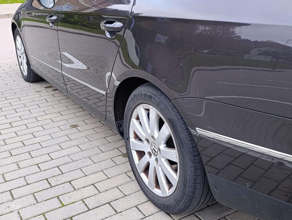 Volkswagen Passat 2009 — photo 14