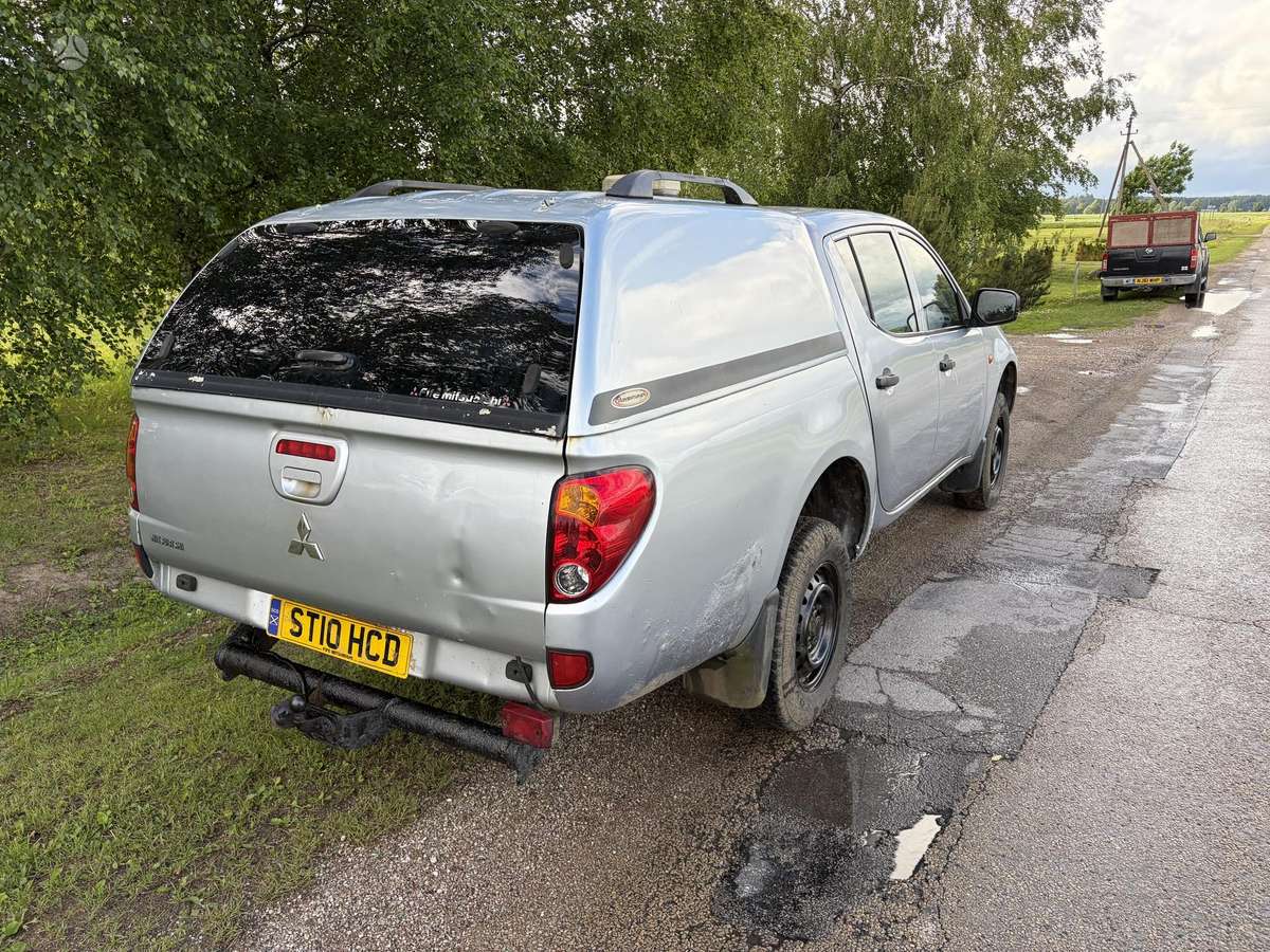 Mitsubishi L200 2010 — photo 6