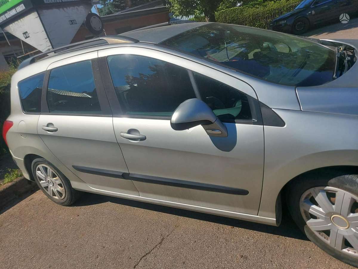 Peugeot 308 2009 — photo 11