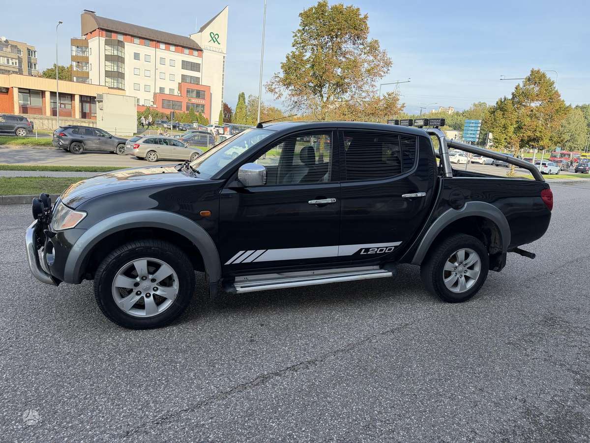 Mitsubishi L200 2007 — вигляд ззаду