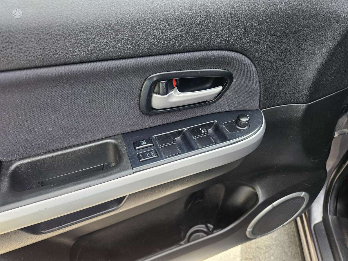 Suzuki Grand 2014 — engine 1900 cm³, 129 HP (95kW)