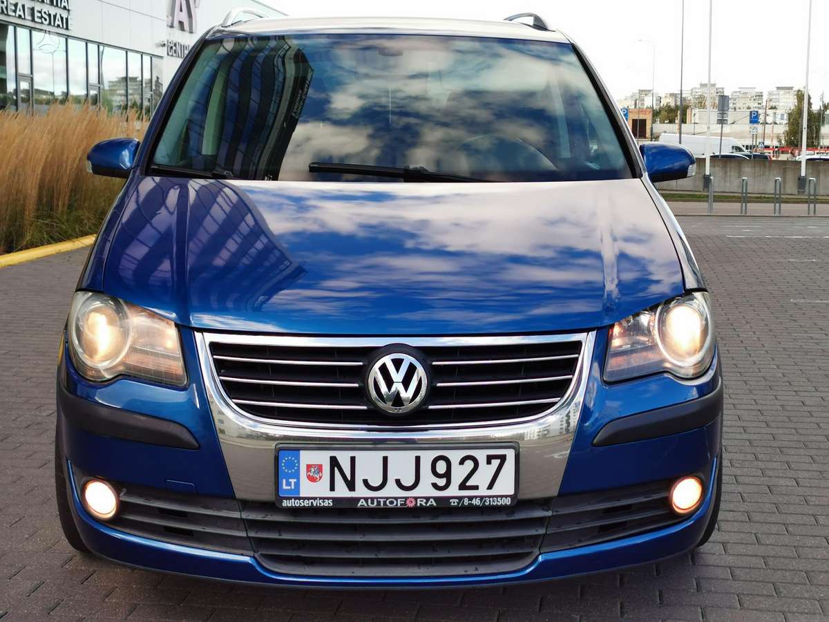 Volkswagen Touran 2009 — engine 1896 cm³, 105 HP (77kW)