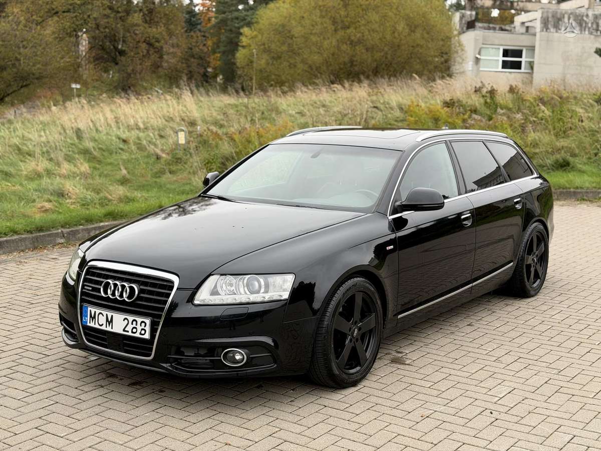 Audi A6 2010 — вигляд ззаду