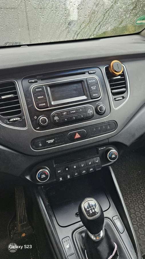 Kia Carens 2014 — photo 11
