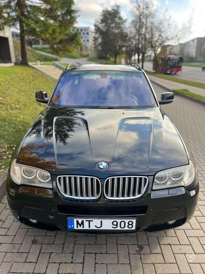 BMW X3 2010 — rear view
