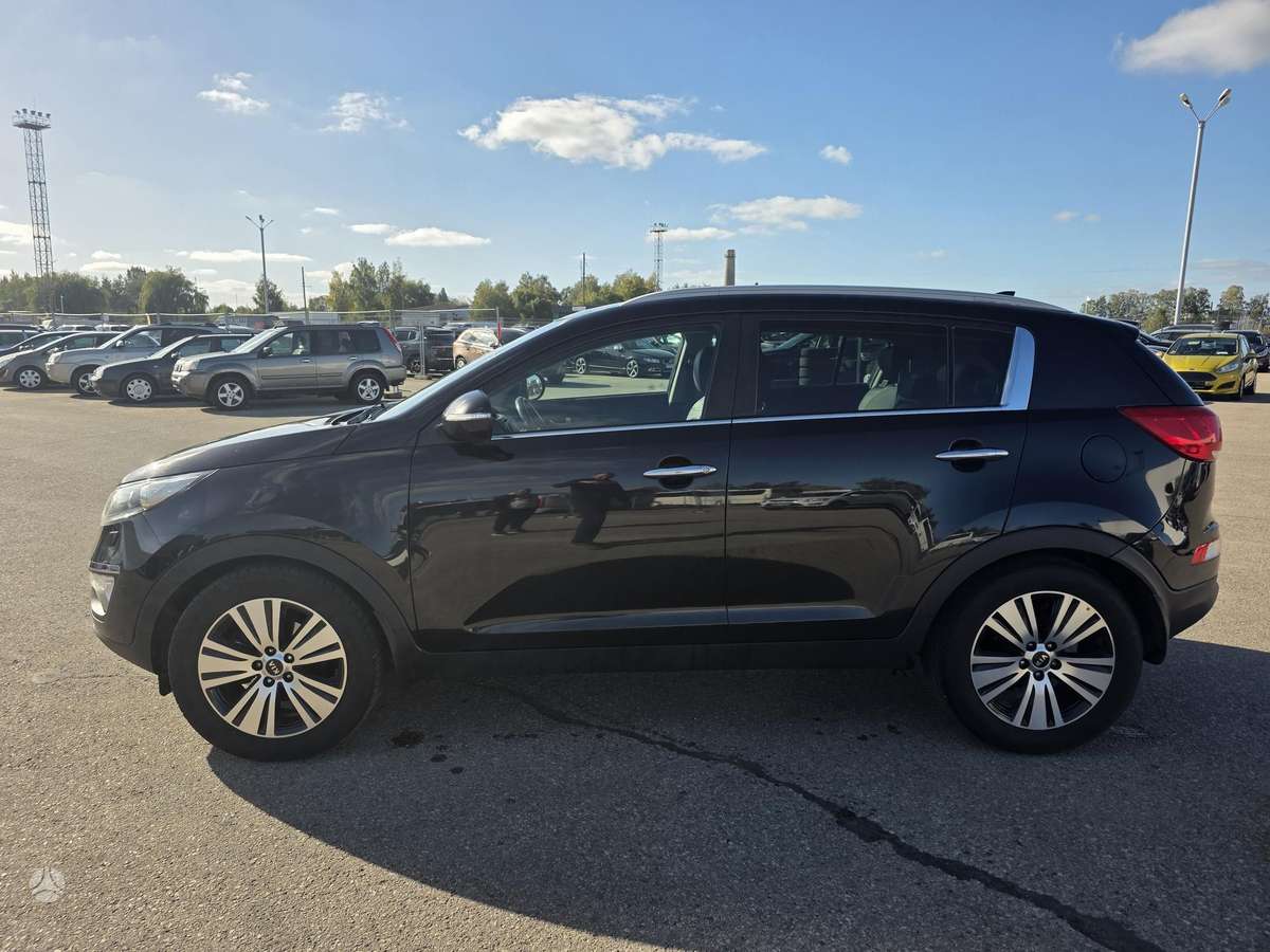 Kia Sportage 2014 — engine 1685 cm³, 116 HP (85kW)