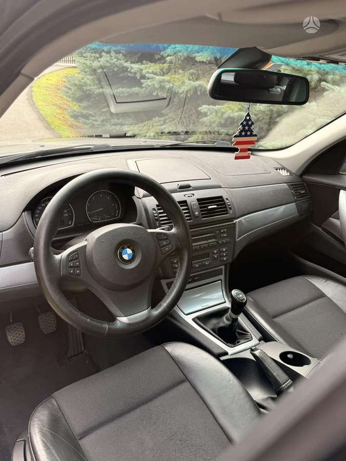 BMW X3 2009 — rear view