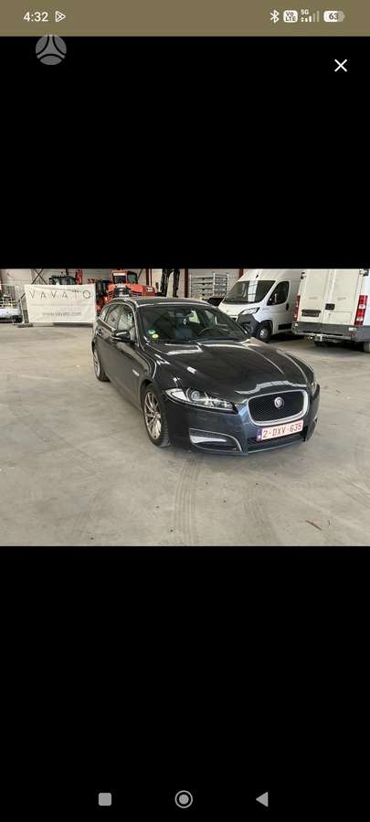 Jaguar XF 2014 — вигляд ззаду