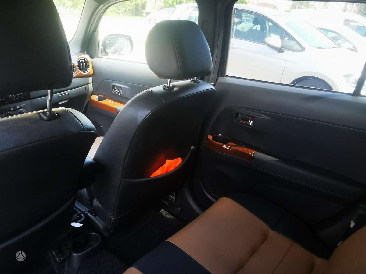 Daihatsu Materia 2007 — photo 16
