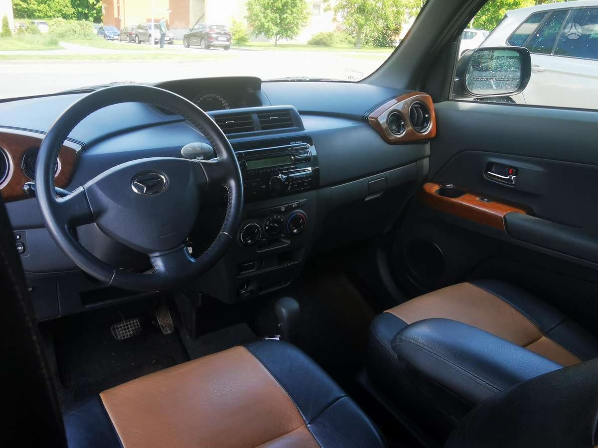 Daihatsu Materia 2007 — photo 17