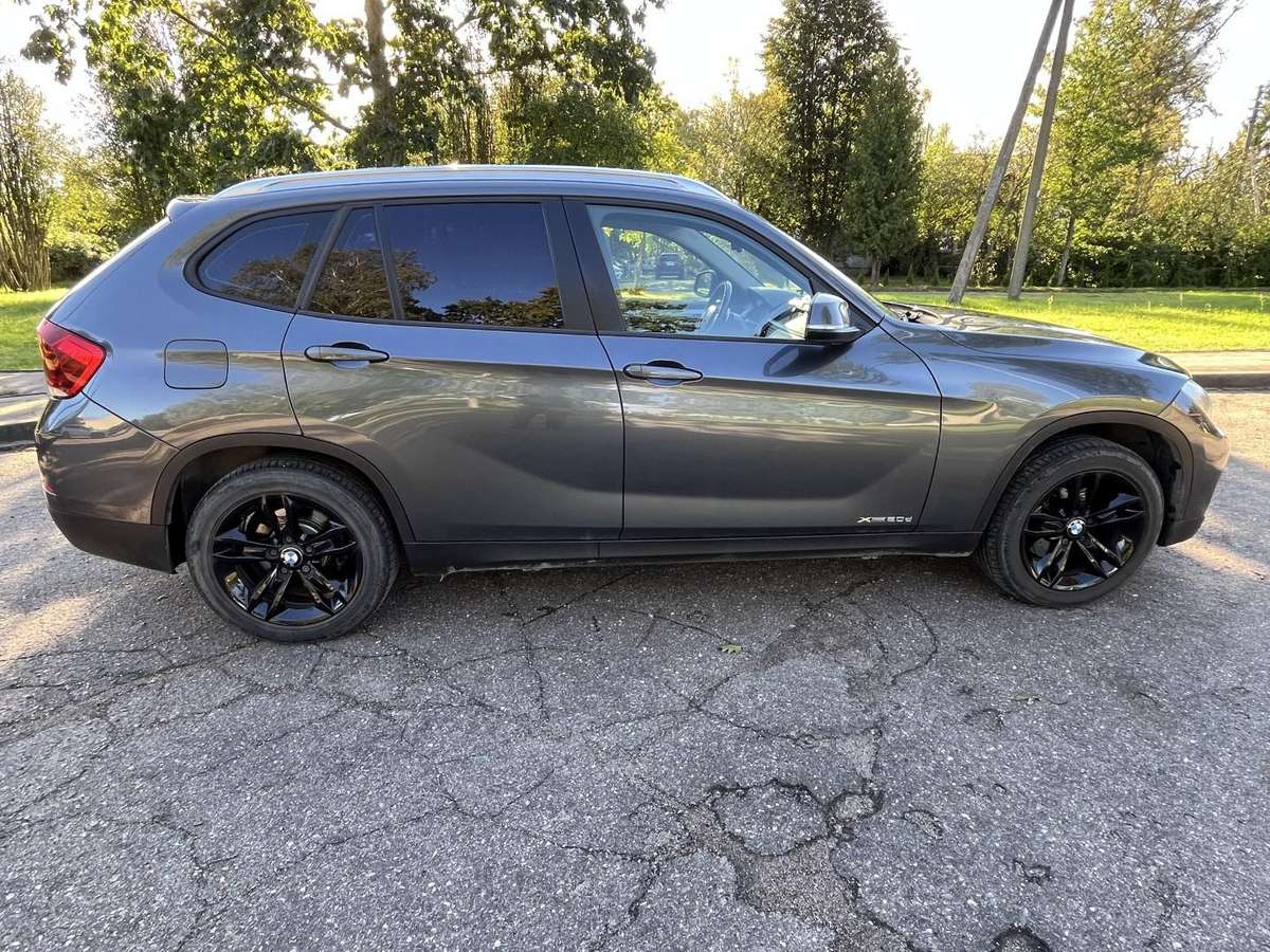 BMW X1 2014 — engine 1995 cm³, 184 HP (135kW)