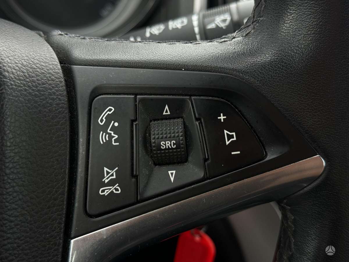 Opel Astra 2014 — фото 19