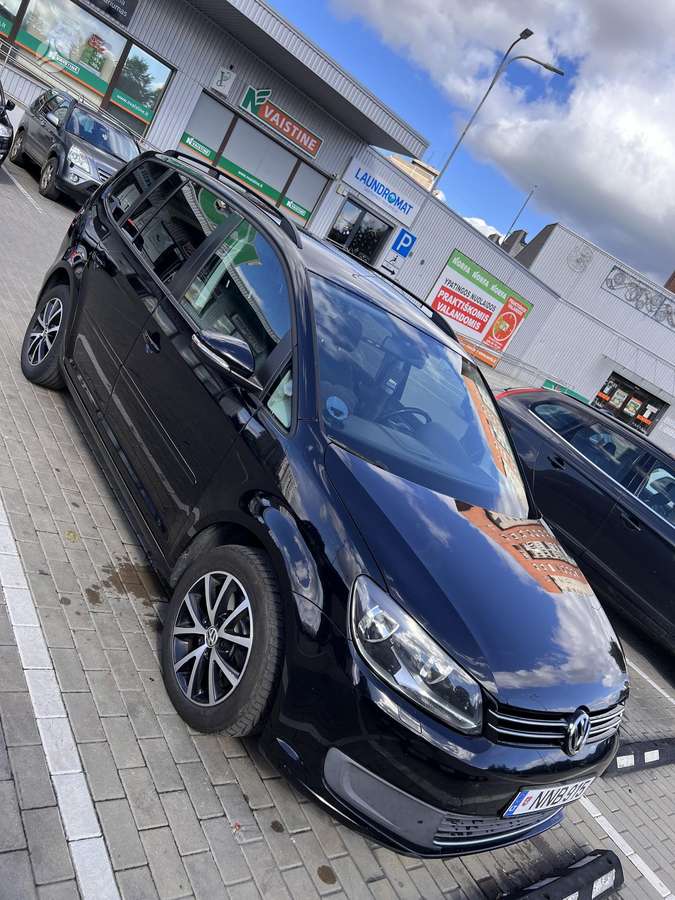 Volkswagen Touran 2011 — engine 1968 cm³, 140 HP (103kW)