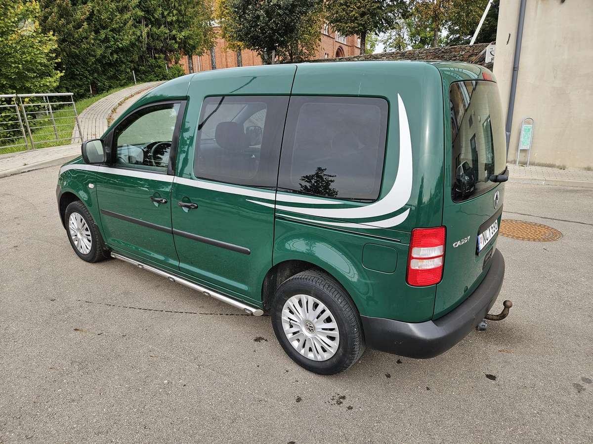 Volkswagen Caddy 2013 — вигляд ззаду