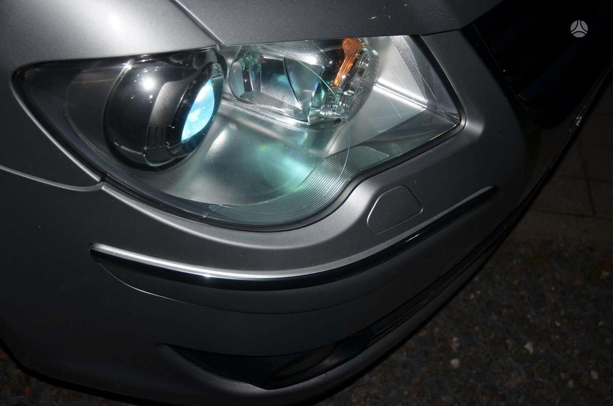 Volkswagen Touran 2009 — engine 2000 cm³, 140 HP (103kW)