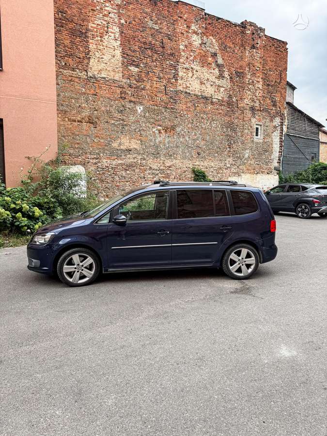 Volkswagen Touran 2011 — engine 1968 cm³, 170 HP (125kW)