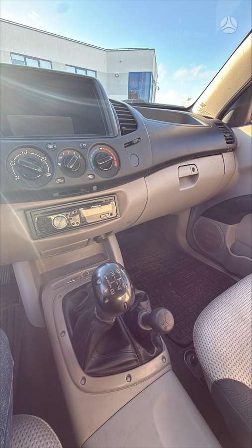 Mitsubishi L200 2010 — photo 10
