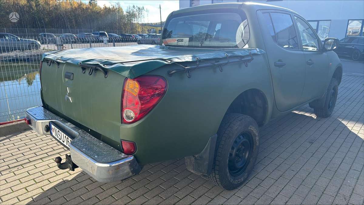 Mitsubishi L200 2010 — photo 5