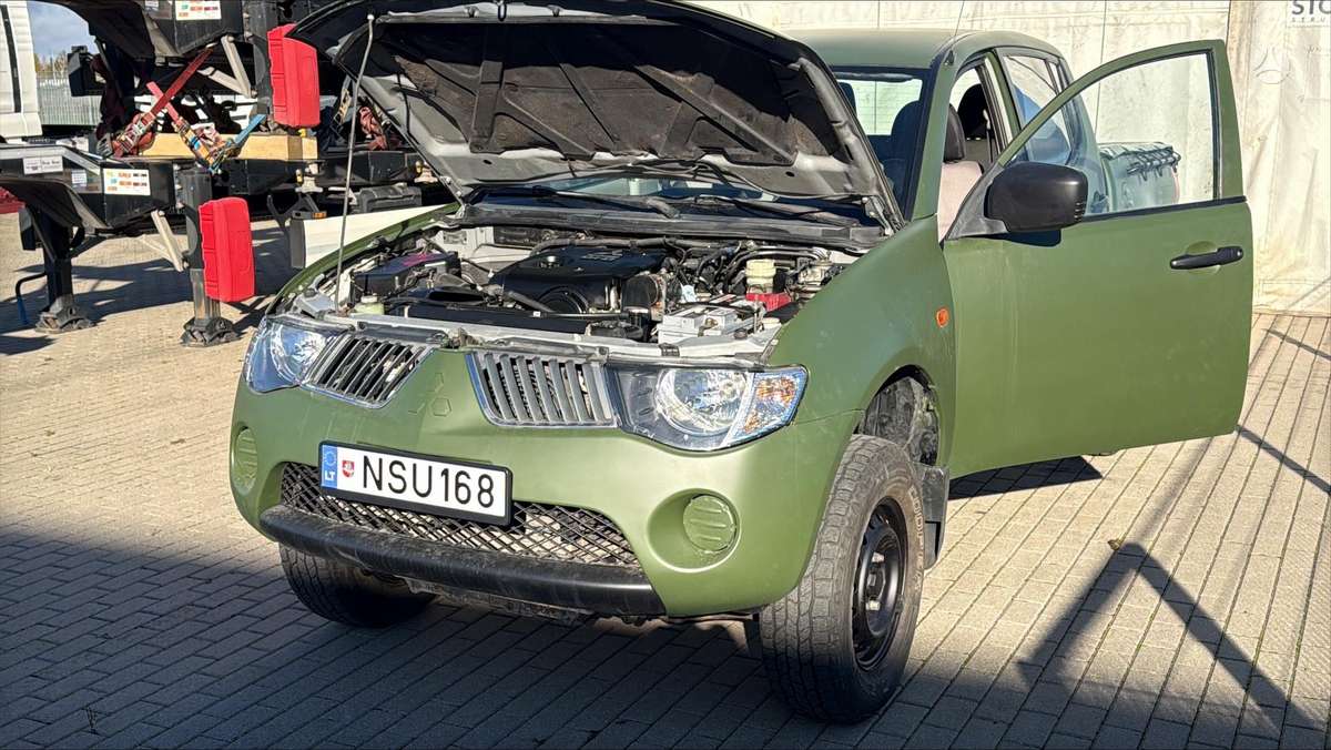 Mitsubishi L200 2010 — photo 8