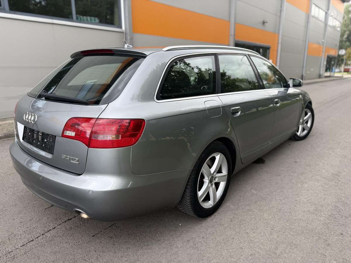 Audi A6 2009 — engine 2967 cm³, 239 HP (176kW)