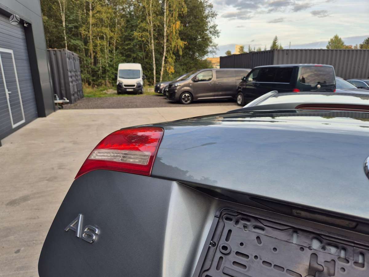 Audi A6 2009 — photo 26