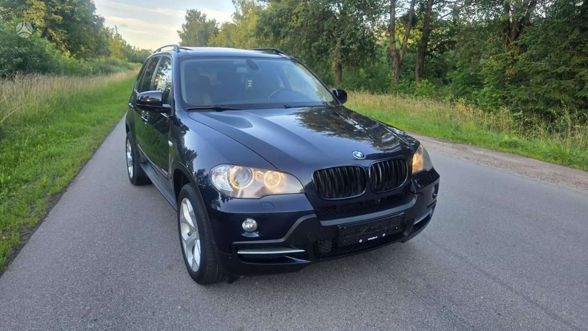 BMW X5 2009 — photo 11
