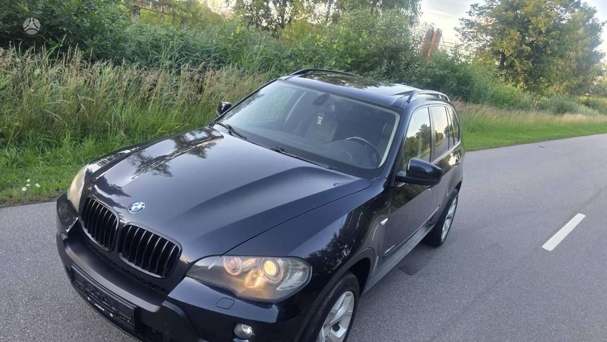 BMW X5 2009 — engine 2996 cm³, 272 HP (200kW)