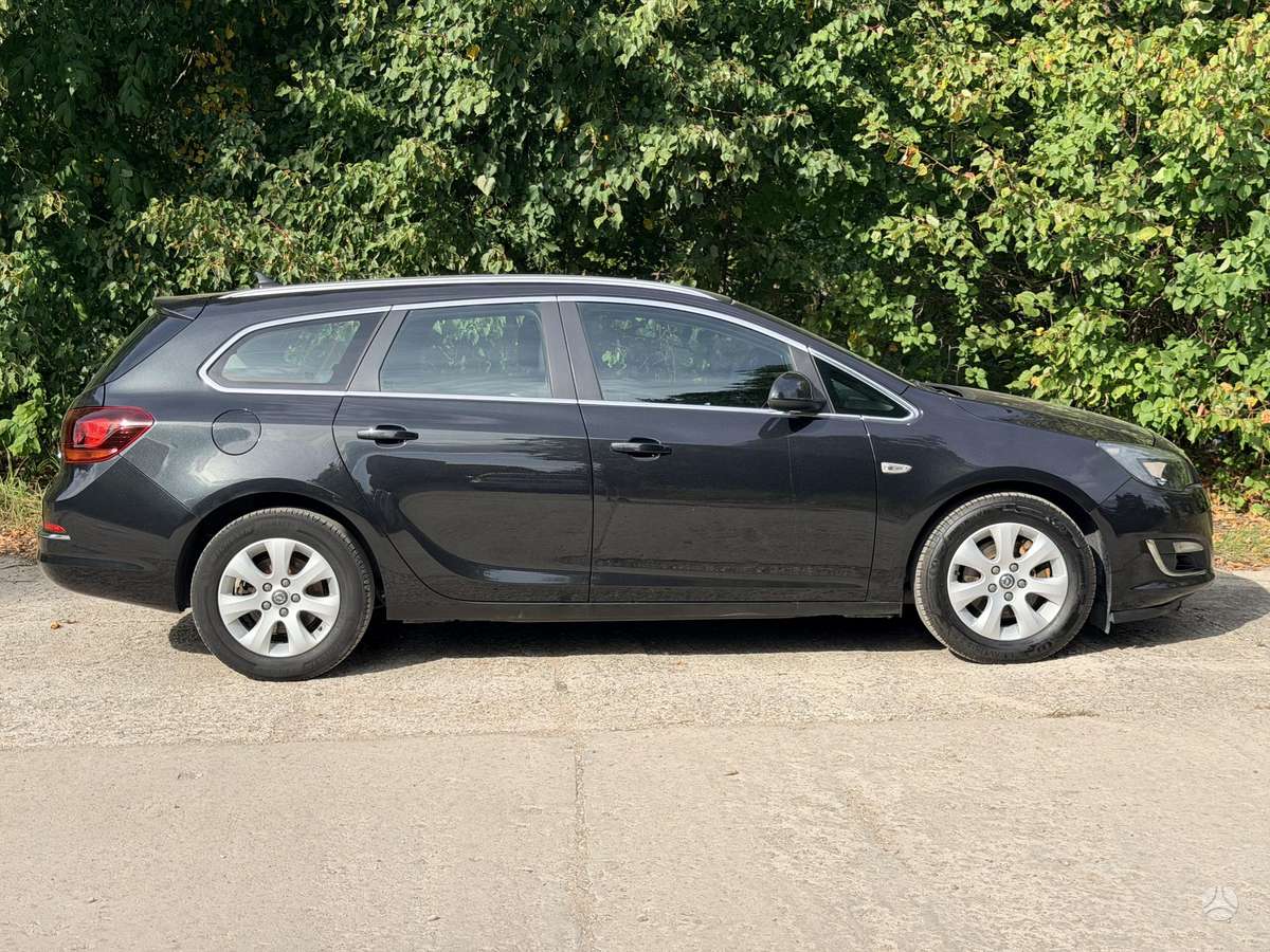 Opel Astra 2014 — photo 13