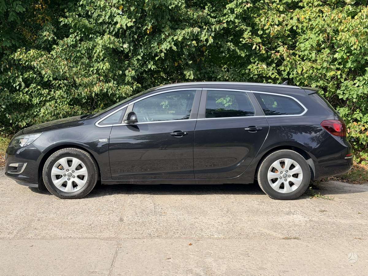 Opel Astra 2014 — photo 7