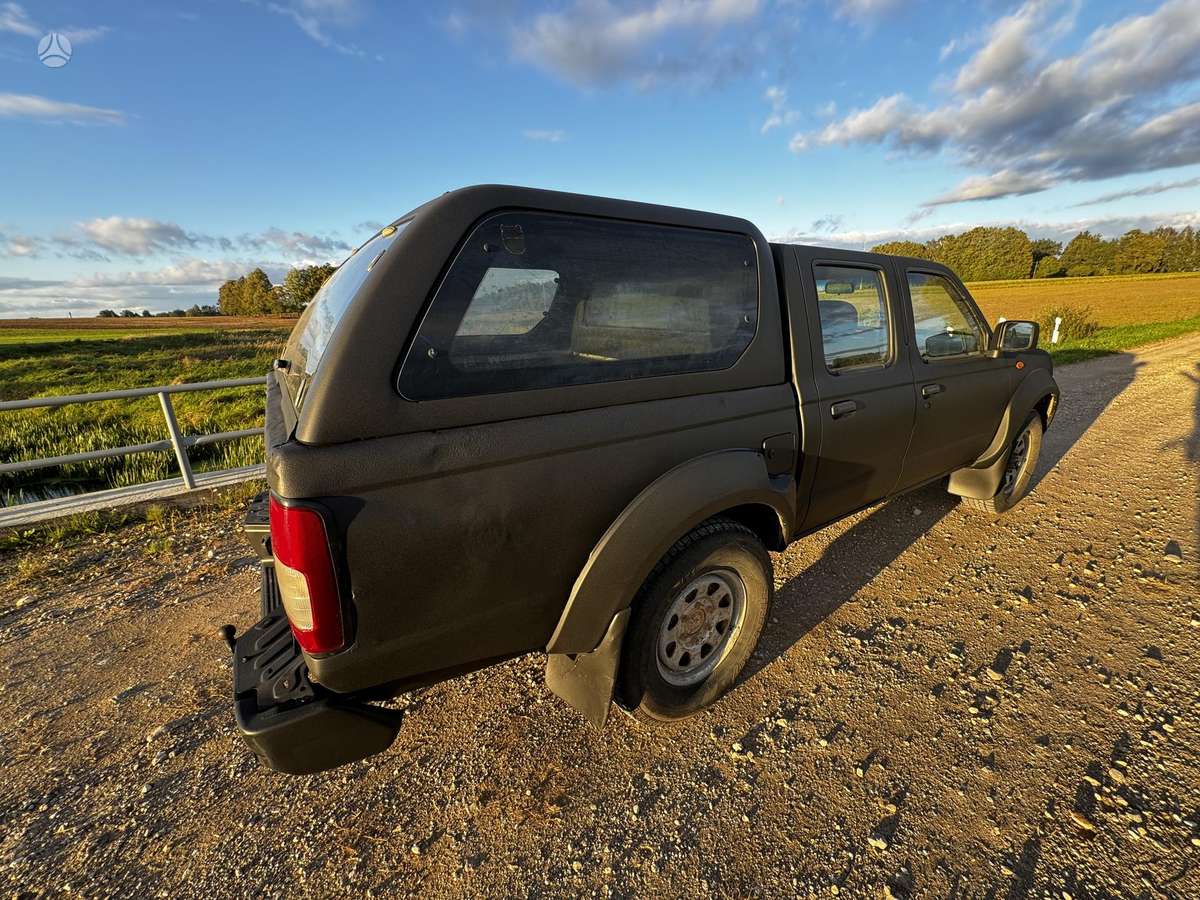 Nissan Navara 2008 — двигун 2500 cm³, 133 HP (98kW)