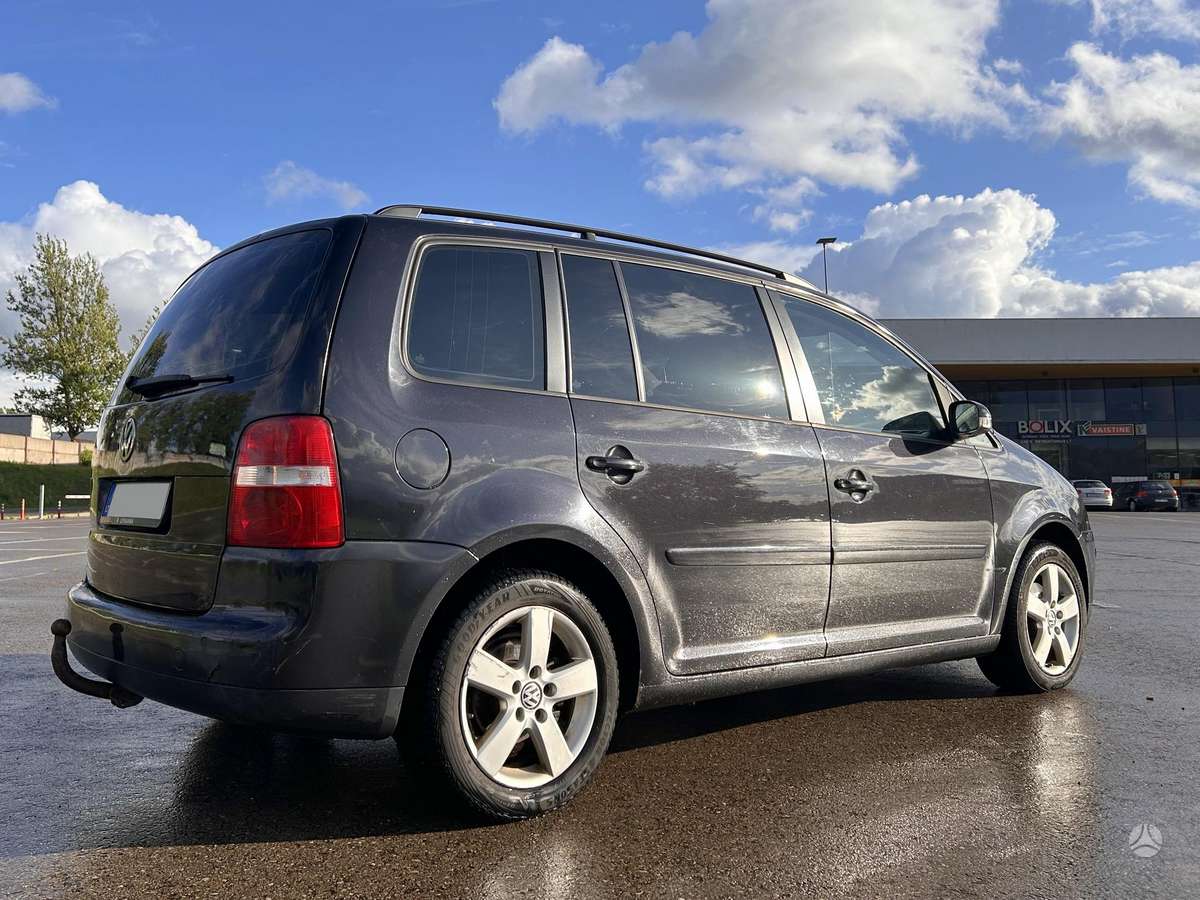 Volkswagen Touran 2006 — engine 1968 cm³, 140 HP (103kW)