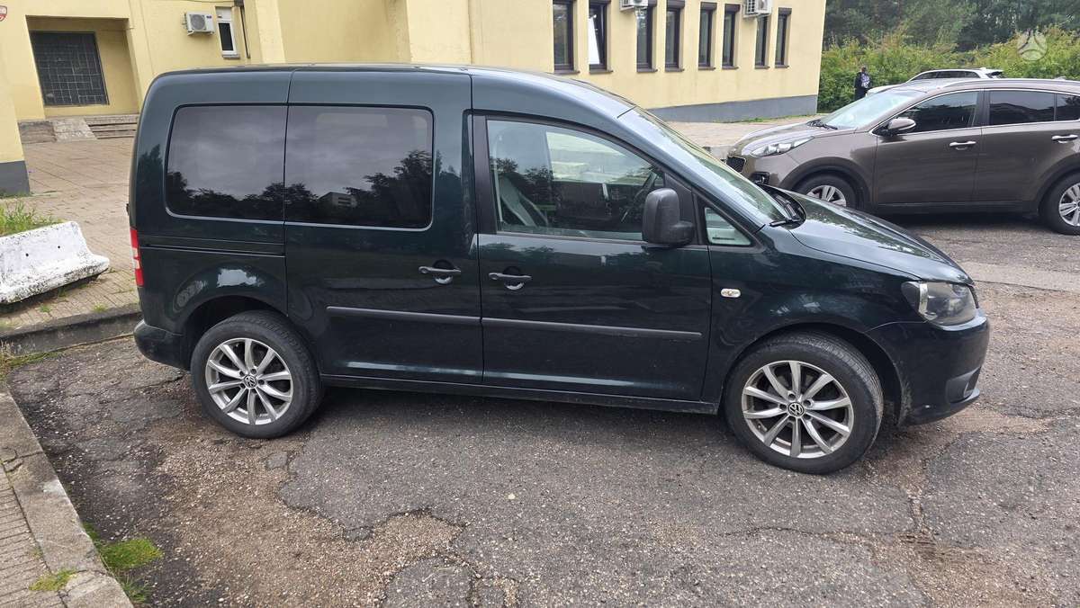 Volkswagen Caddy 2011 — салон